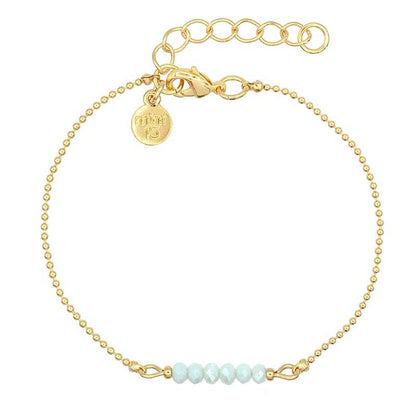 Gouden bolletjes armband blauwe kralen